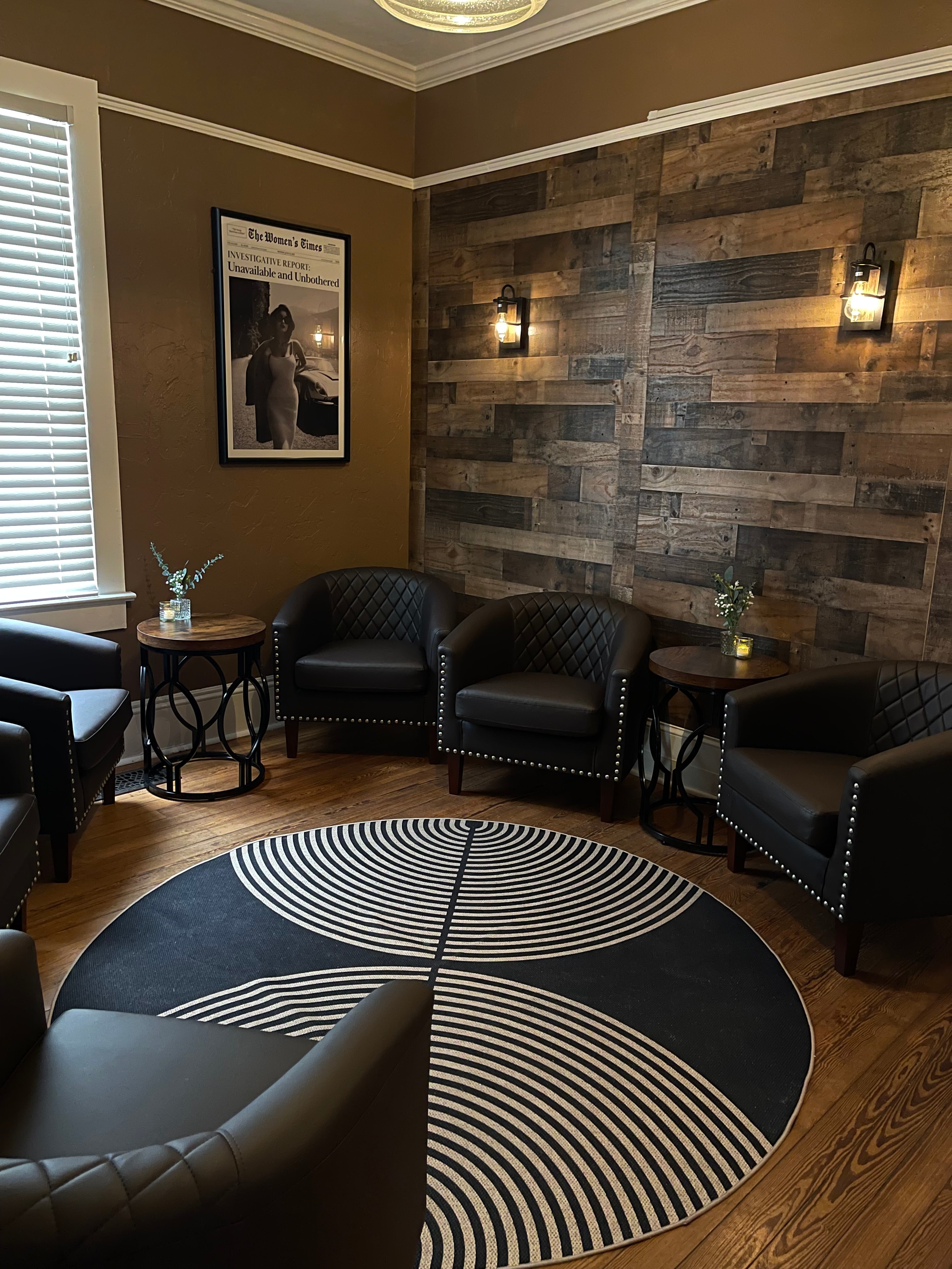 Bright seating room with windows at The Social Cellar